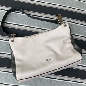 Black & White Coach Purse. Sides are silver.
